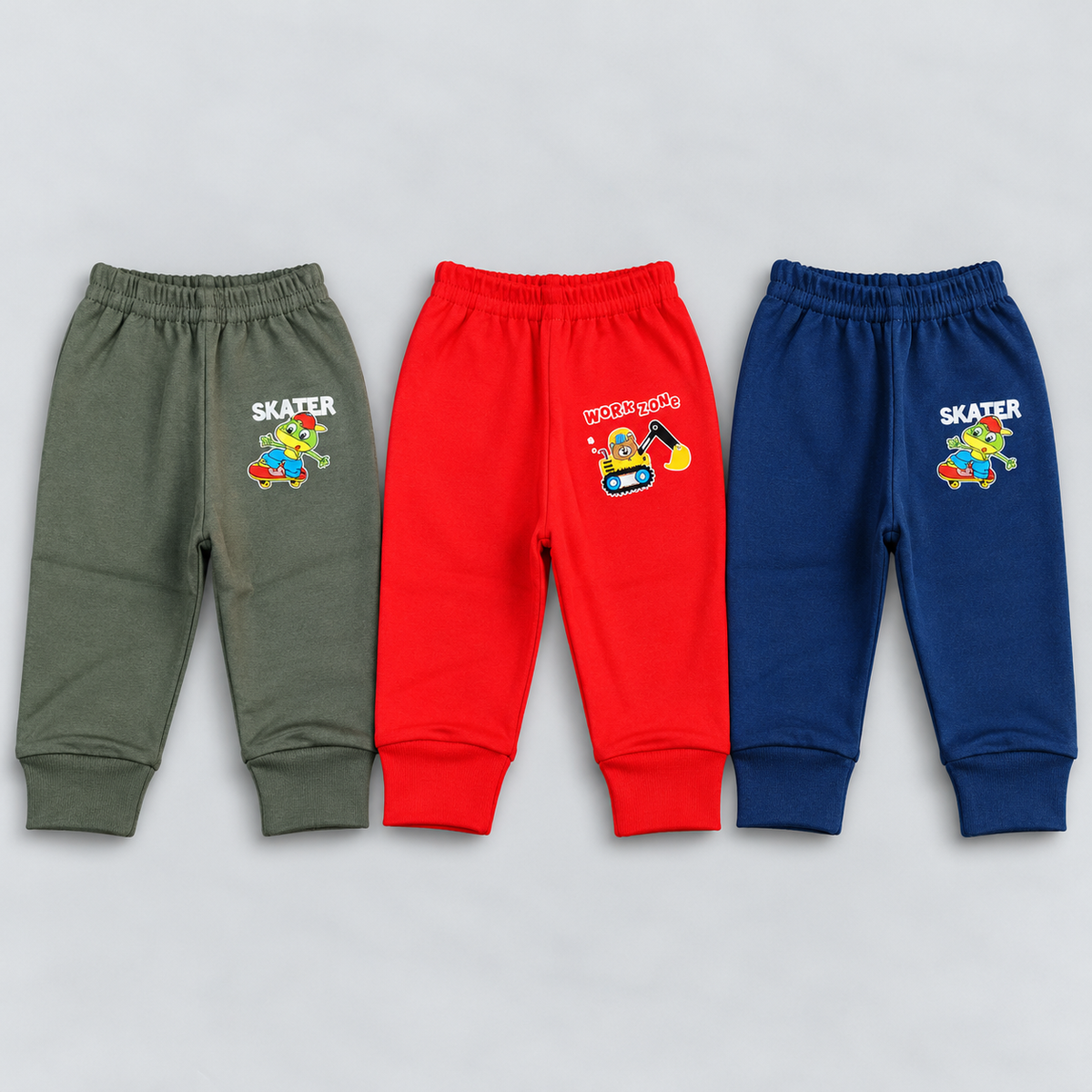 Cucumber baby boys jogger pants set of 3 in olive green, red and navy blue with colorful cartoon prints, elastic waistbands and ribbed ankle cuffs