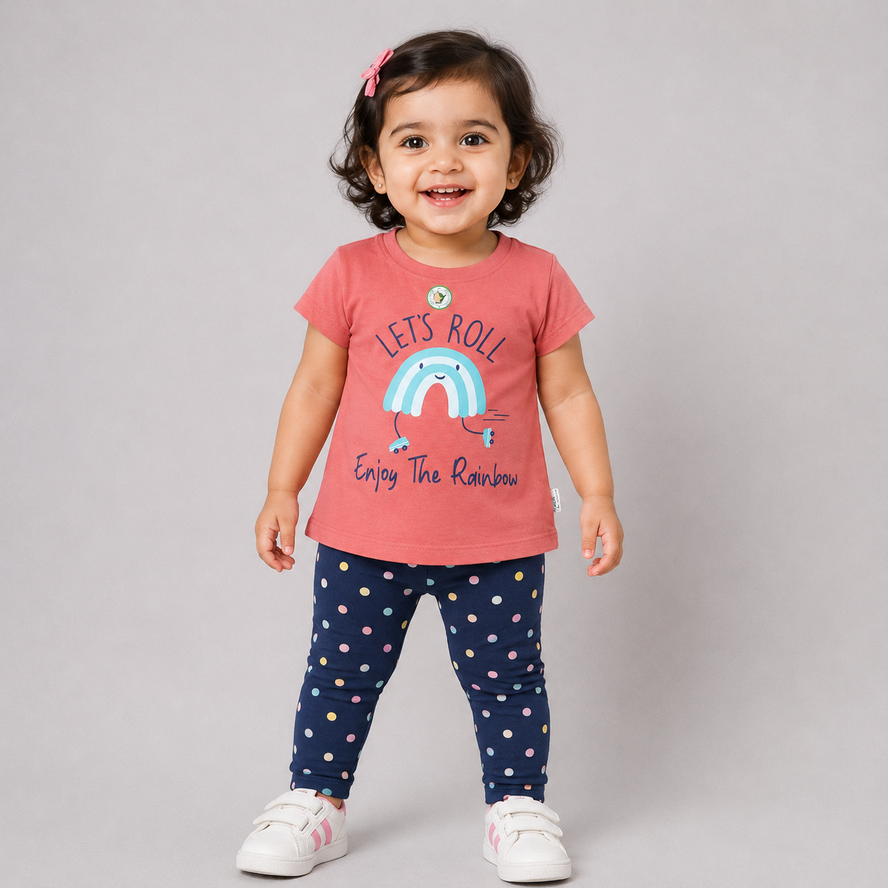 Hazelnut baby girls rose pink printed top with colorful rainbow graphic