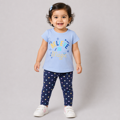 Hazelnut baby girls sky blue printed top with Believe in Magic graphic