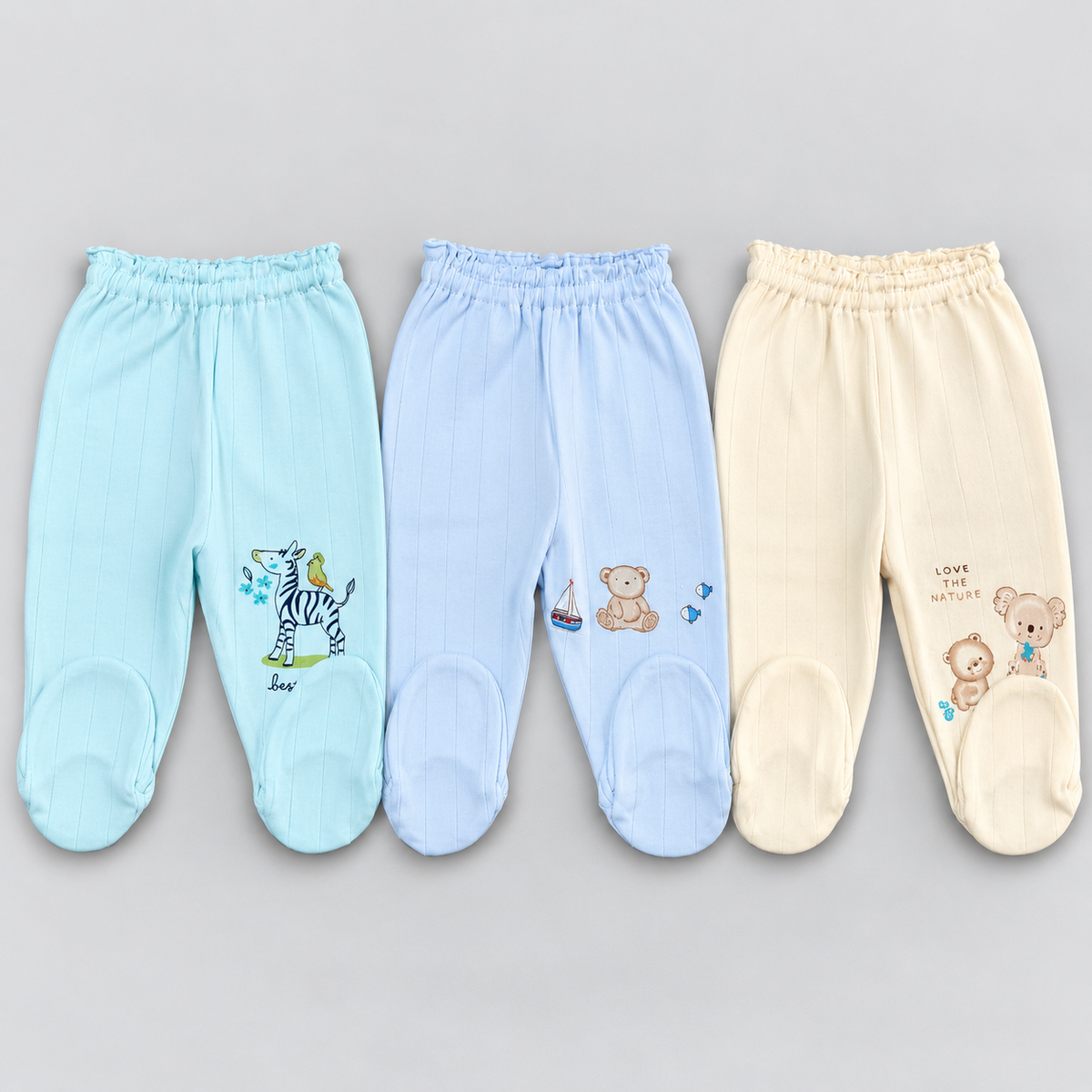 Zero baby cotton footed pajama pants in green, light blue and cream with cute animal prints and elastic waistbands