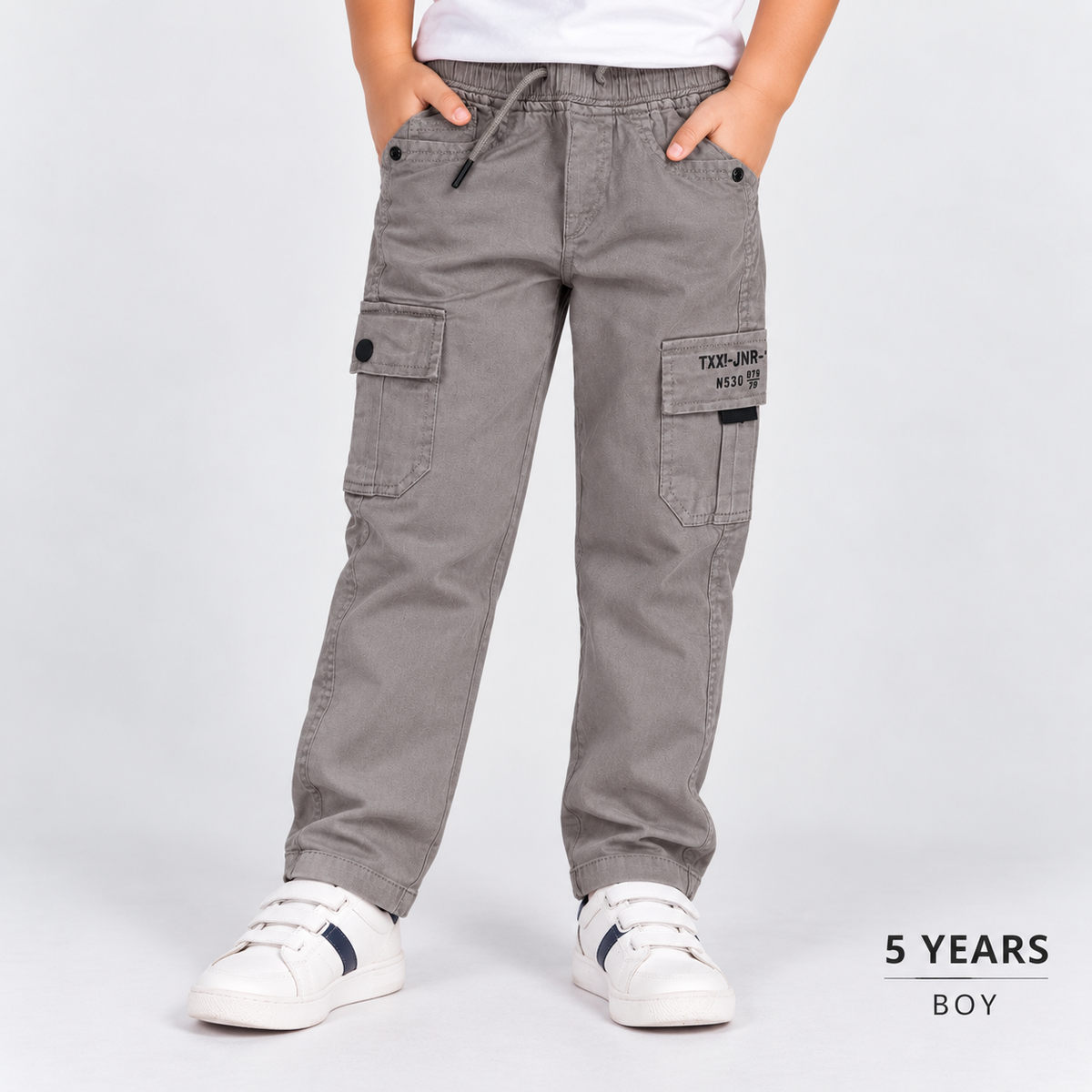Taxi Junior boys grey cargo pants with elastic waist, drawstring and utility pockets | Cutypi
