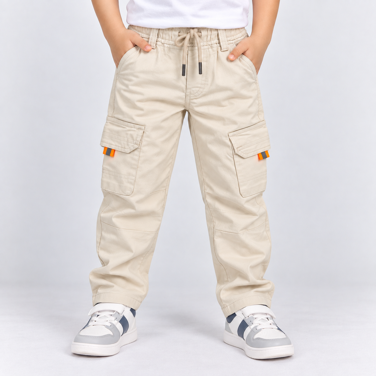 Taxi Junior boys cream cargo pants with elastic waist, drawstring and multiple utility pockets | Cutypi