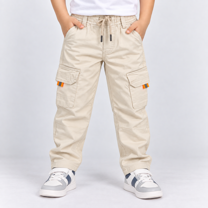Taxi Junior boys cream cargo pants with elastic waist, drawstring and multiple utility pockets | Cutypi