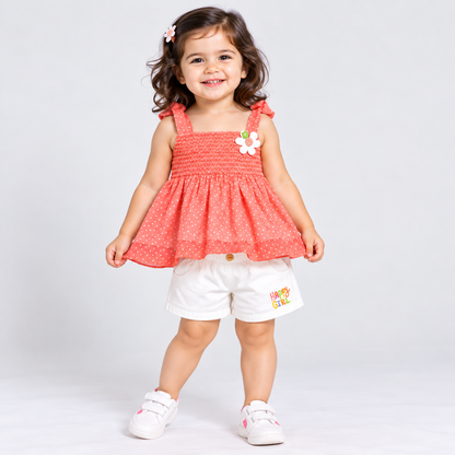 Orrigany girls coral printed sleeveless dress with white shorts and flower detail
