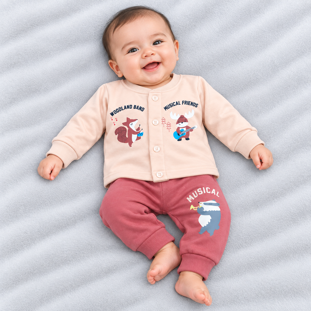 Cucumber baby peach pink fleece winter suit with woodland animal prints featuring a musical fox and moose, paired with dusty rose jogger pants with a musical animal graphic