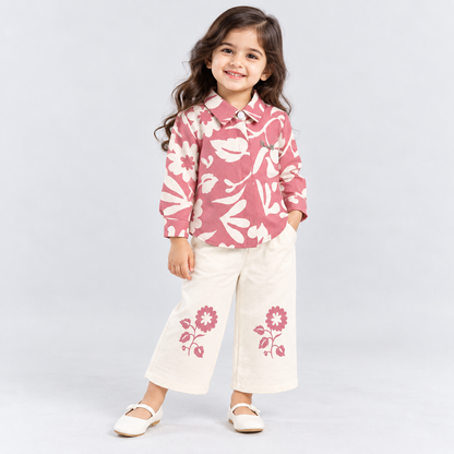 Little Daisy girls pink floral printed shirt with cream wide-leg pants featuring matching floral prints