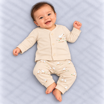 Zero baby cream co-ord set featuring a full-sleeve button-front top with a cute duck and duckling chest print and matching all-over duck-print pants