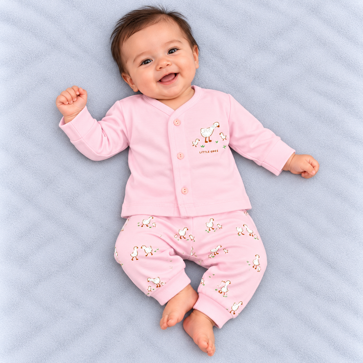 Zero baby pink co-ord set featuring a button-front full-sleeve top with a cute duck appliqué print and matching duck-print pants