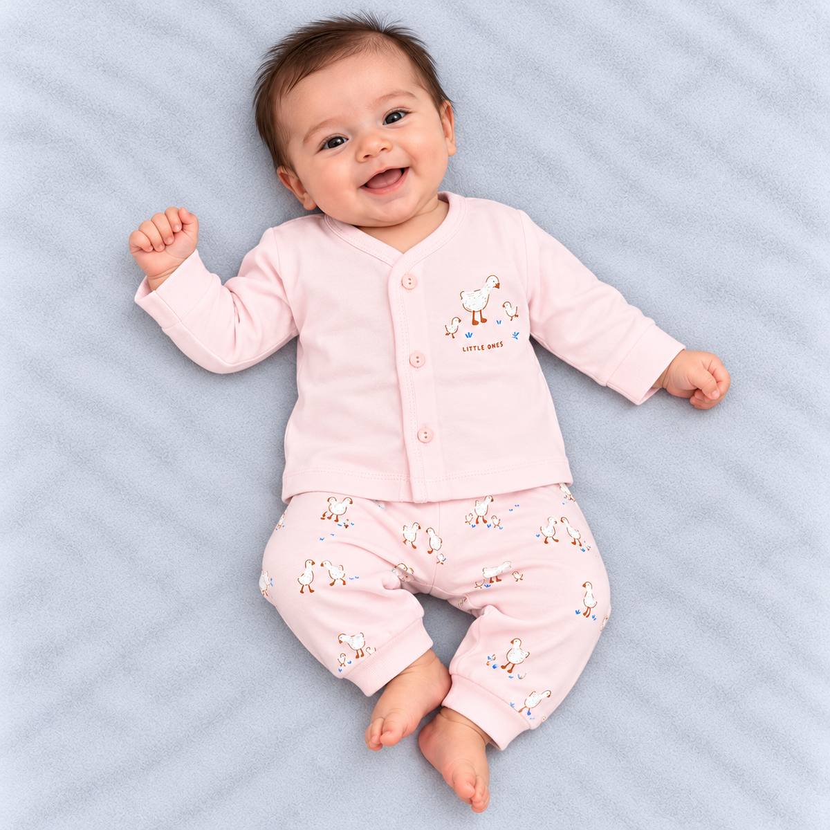Zero baby pink co-ord set with cute white duck prints, blue accents, full-sleeve button-front top and matching elastic-waist pants