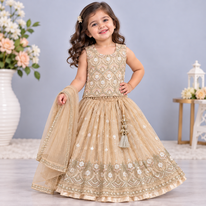 Cutypi girls champagne gold embroidered lehenga choli with sleeveless embellished blouse, flared lehenga skirt, sequin detailing and matching dupatta