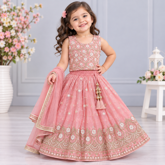 Cutypi girls dusty pink embroidered lehenga choli with sleeveless floral embellished blouse, flared lehenga skirt, gold sequin work and matching pink dupatta